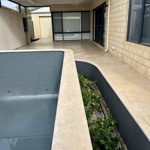 A house with a pool in the backyard.