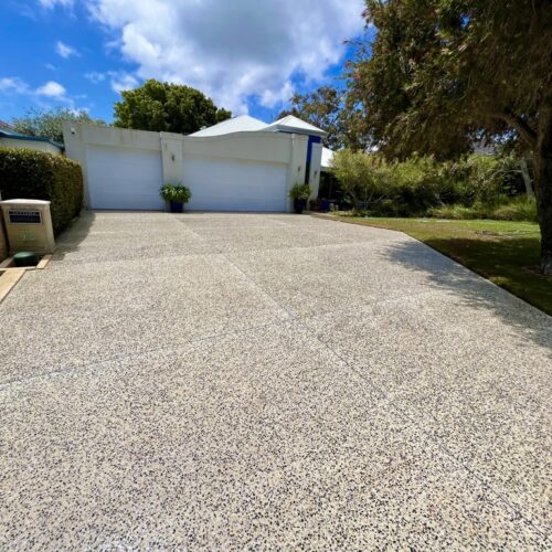 An image of a driveway with a concrete driveway.